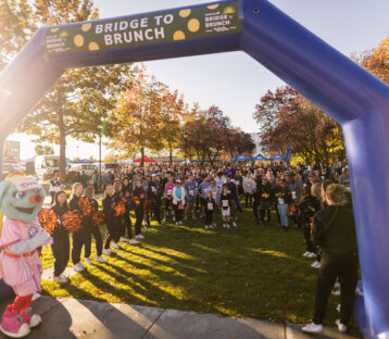 Runners wait at the starting line for Bridge to Brunch 5K in Fall 2024