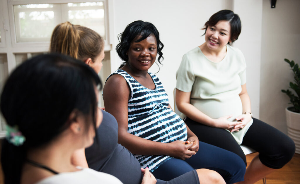 Pregnant women in a class