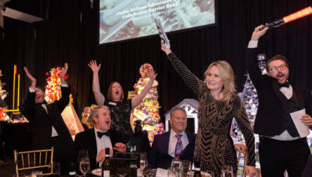 Gary and Sunny Racca bid big at Festival of Trees for an UnBelizable tree package sponsored by Alaska Airlines.