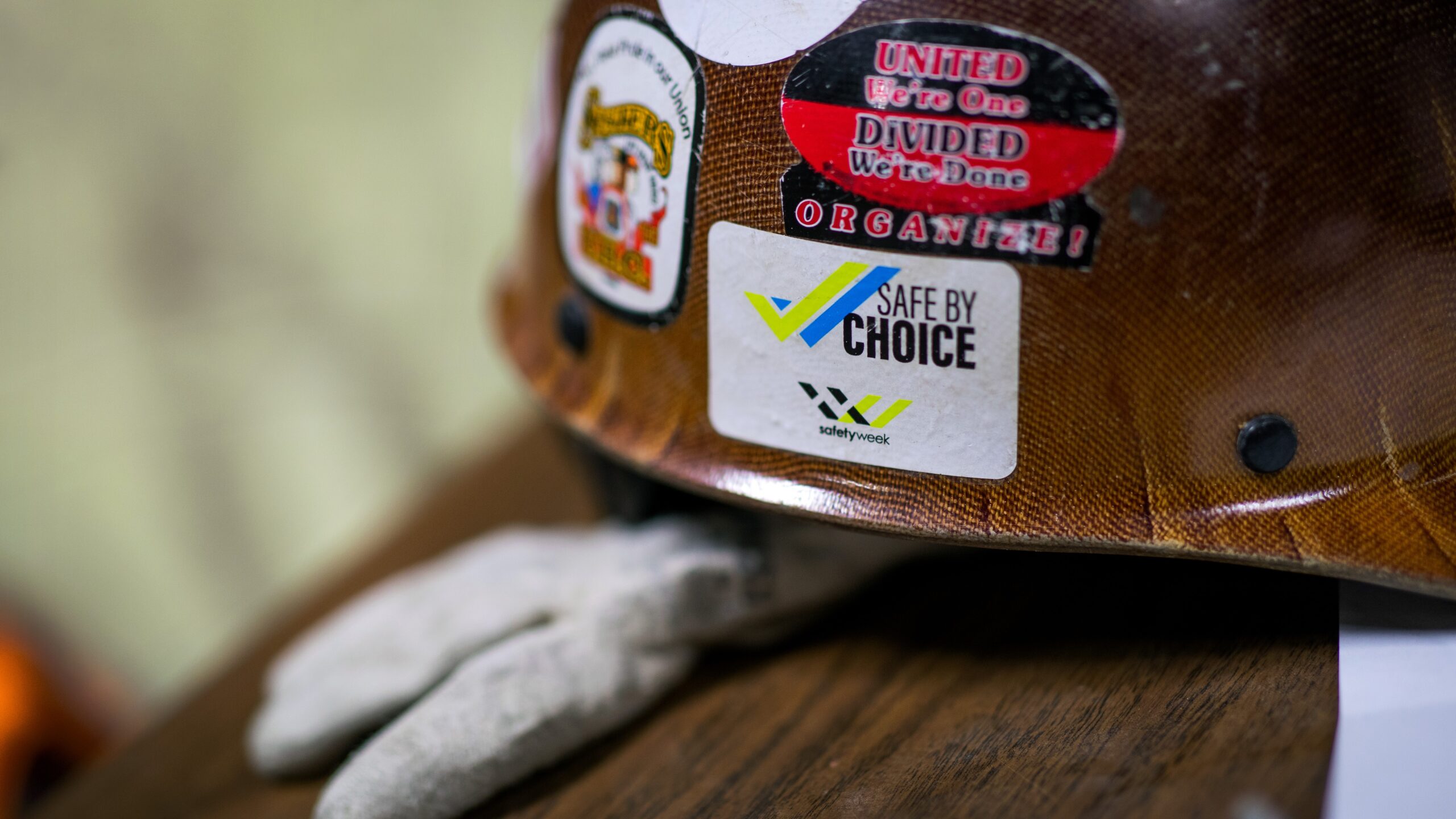 Hard hat with safety stickers on it