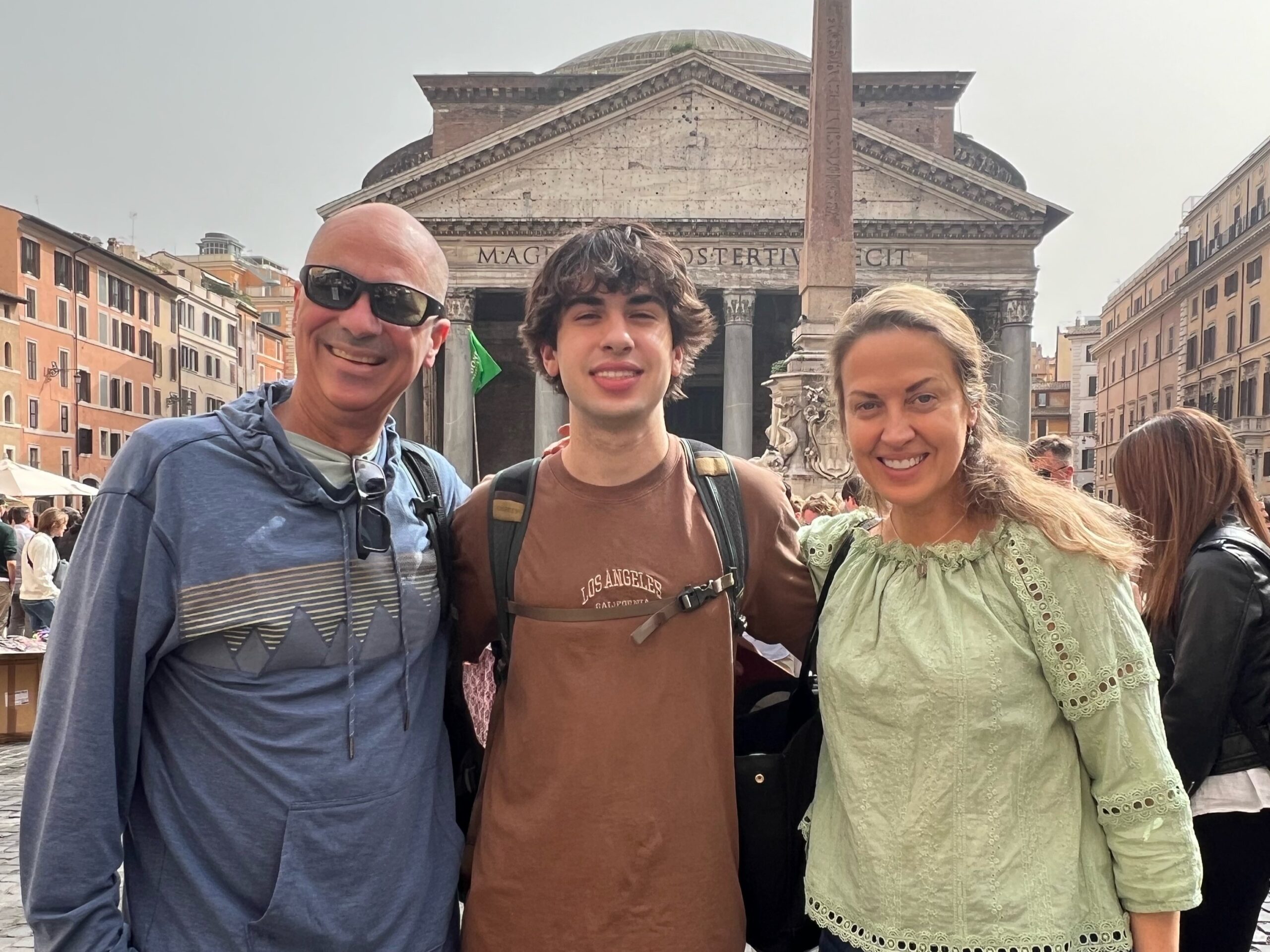 Man with son and wife at Pantheon in Rome
