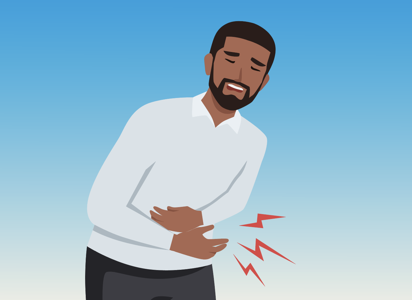 Man holds his abdomen in pain
