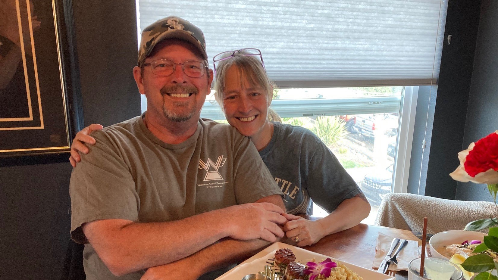 Man and woman at restaurant table