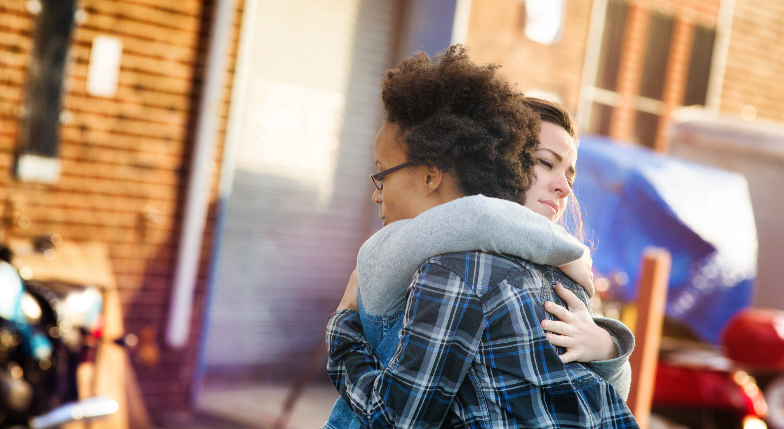 Two people hugging